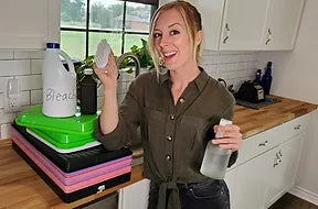 Co Owner of On The Grow, LLC Mandi Warbington in the kitchen showing how to Clean and Sanitize Microgreens Trays for YouTube