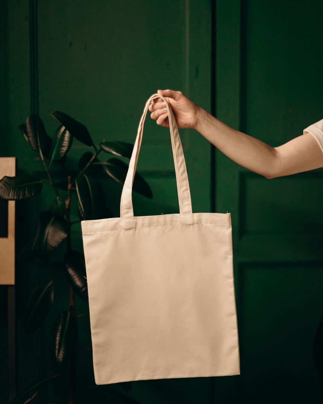 woman holding a tote bag