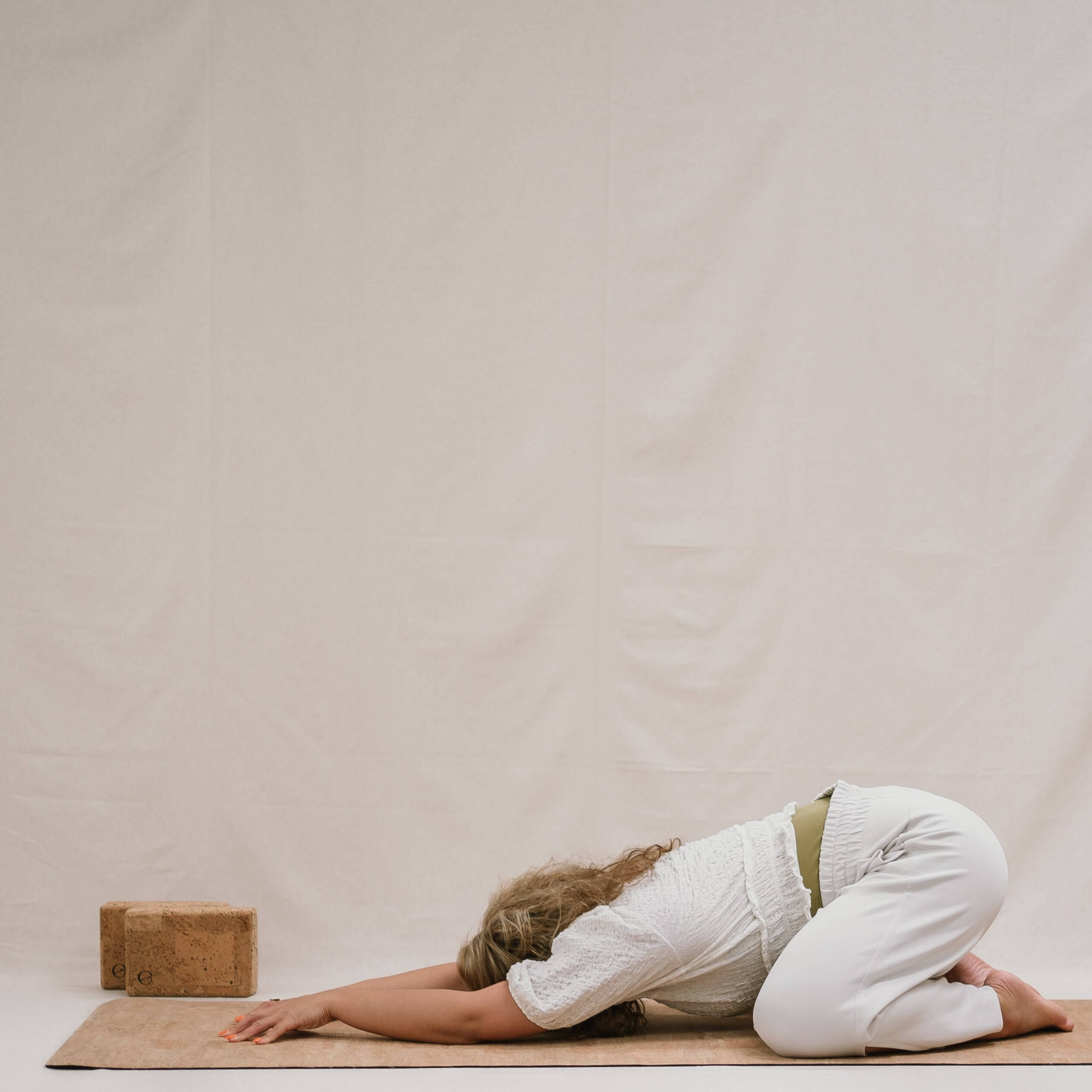 woman doing a child's pose