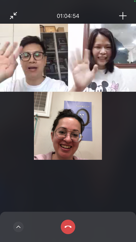 Unbelts founder Claire, south China factory owner Ms. Ou, and production coordinator Percy smile and wave at each other in a video chat screenshot.