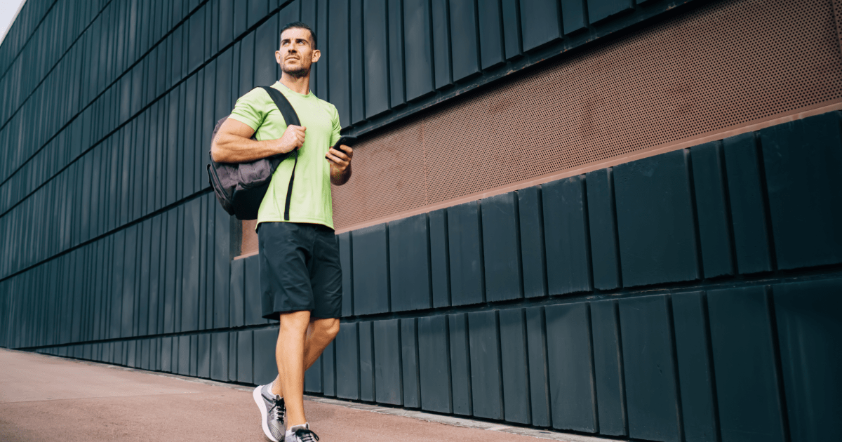 A man walking with a ruck sack | Ultimate Nutrition
