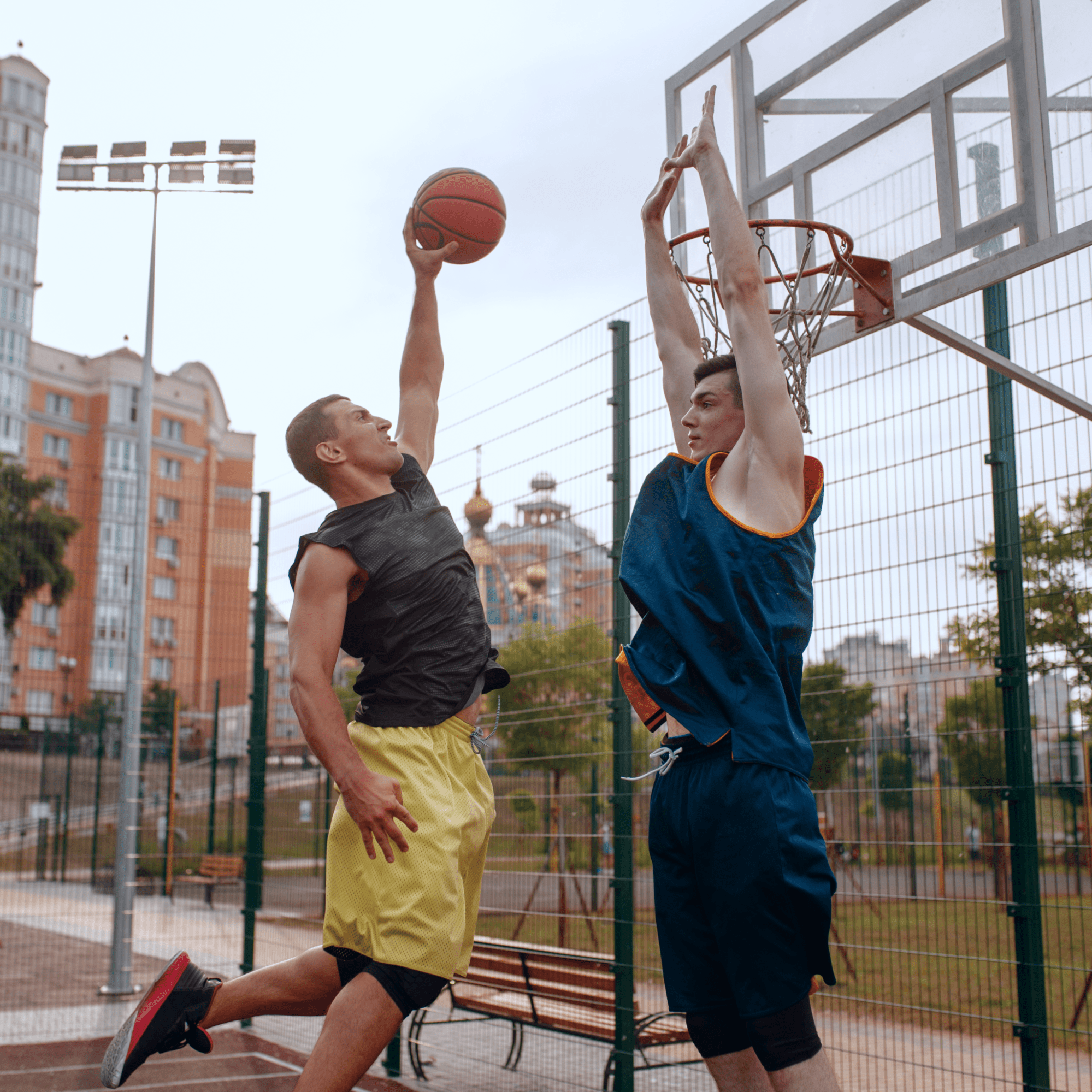 Two men playing basketball | Ultimate Nutrition