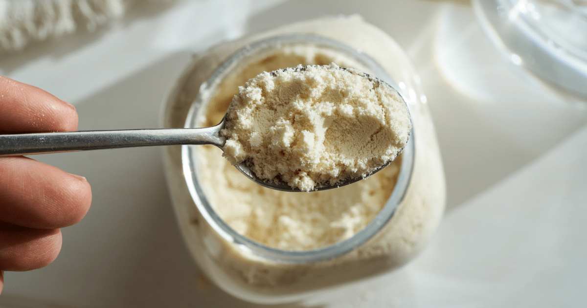 Protein powder in mug | Ultimate Nutrition
