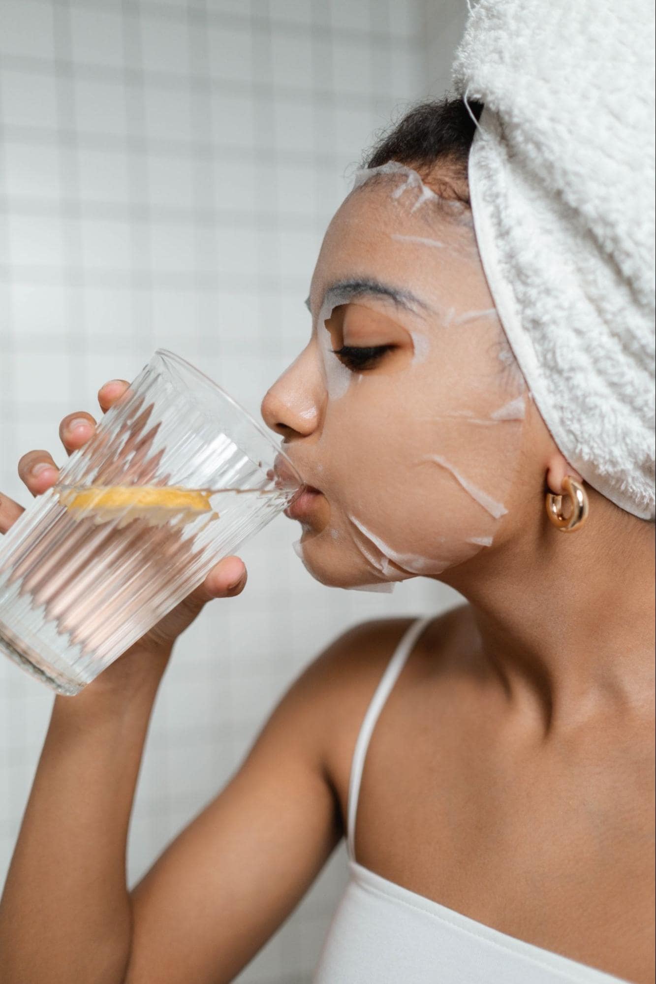 person glass of water