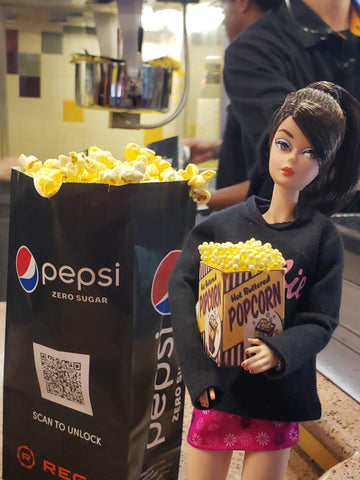 barbie with popcorn