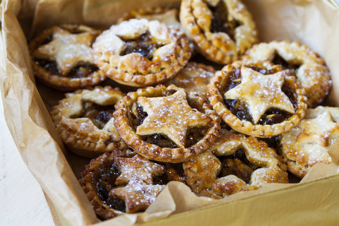 Mincemeat tarts with star tops and dusted with icing sugar