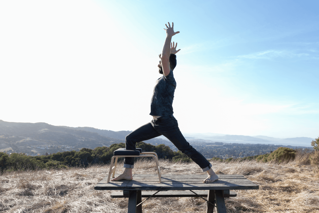 Warrior Virabhadrasana 1 with FeetUp outdoors