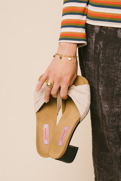 The sustainable Scrappy Sandals from Zest Dressed; also in this picture is the RIVA New York Moody Ring in gold vermeil and Madison paper clip charm bracelet