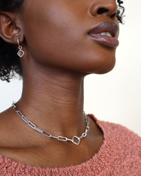 A silver paper clip chain necklace from RIVA New York plated in Rhodium