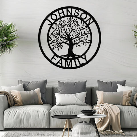 Living room with a family tree metal wall art above the sofa.