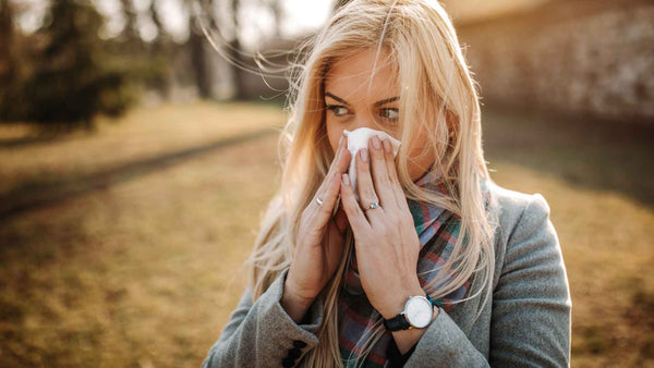 Una mujer con alergias
