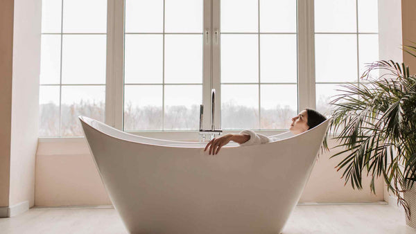 A woman in an oatmeal bath