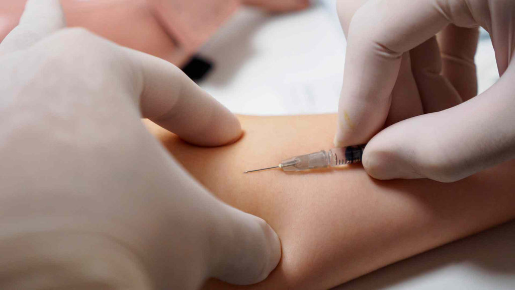 A doctor injecting a corticosteroid