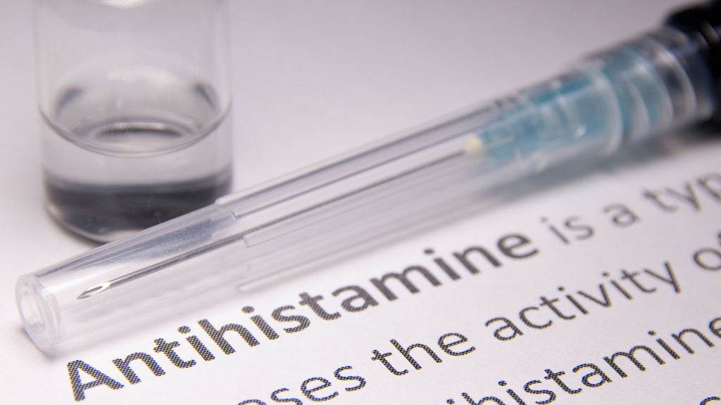 A syringe labeled antihistamine, which can relief for fiberglass irritation on the skin.