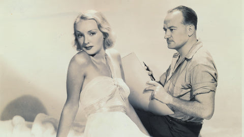 McClelland Barclay poses with actress Sandra Storme for a publicity photo for the 1937 film Artists & Models which they were both in