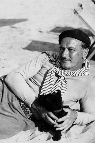 1930s photo of Art Deco artist McClelland Barclay with his scottie dog at the beach in Hampton, NY