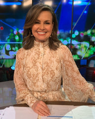 TV presenter wearing pearlsbyella