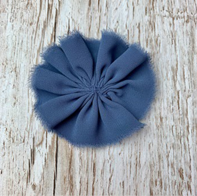 Bunched together blue ribbon to resemble gathered flowers, part four of guide