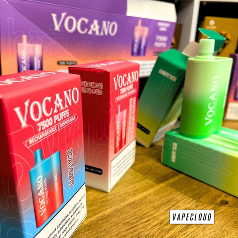 red boxes and green boxes of vocano disposable vapes