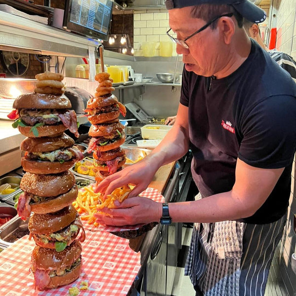 cooking-stacks-of-burgers