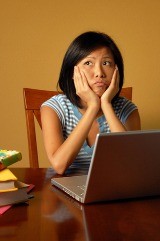 Confused lady at laptop