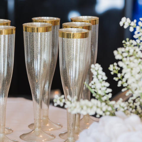 Gold-rimmed champagne flutes