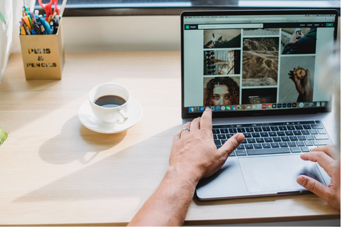 Laptop with photographs on the screen