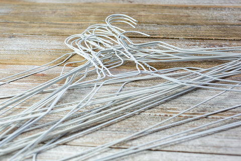 a pile of wire hangers