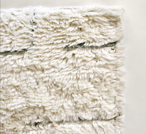 Plush white wool rug