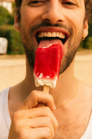 Man eating an icelolly