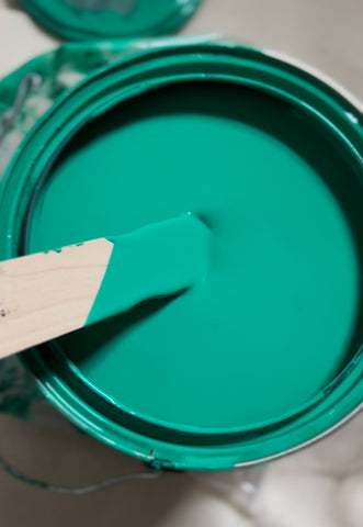 top view of paint can with green paint