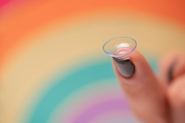 contact lens on fingertip