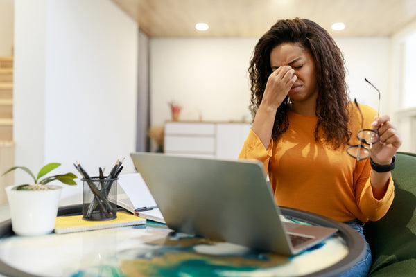 Woman experiencing eye strain