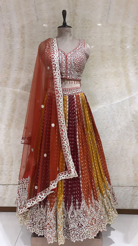 Orange, Rust & Yellow Readymade Lehenga In Net Fabric