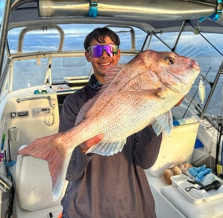 Will Liakos with a solid Snapper on a slow pitch jig