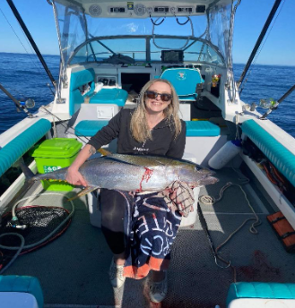 Kara with a nice Yellowfin - fishing report Merimbula