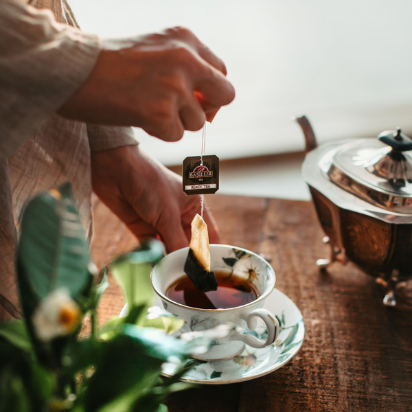 The process of brewing Basilur black Ceylon tea in an express version.