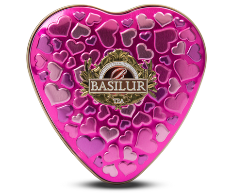 Basilur Forever Happiness green loose-leaf tea with rose, cherry and hibiscus in a heart-shaped can.