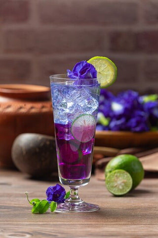 Space version of mohito; a refreshing drink shimmering purple and blue.