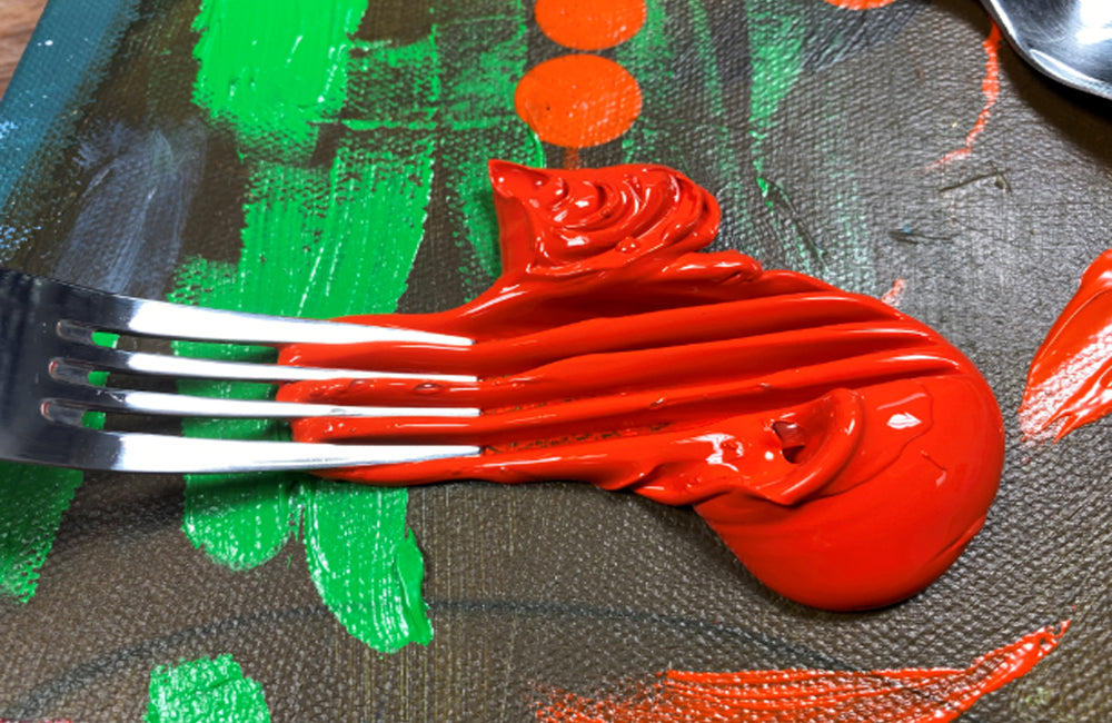 A fork being used to create texture.