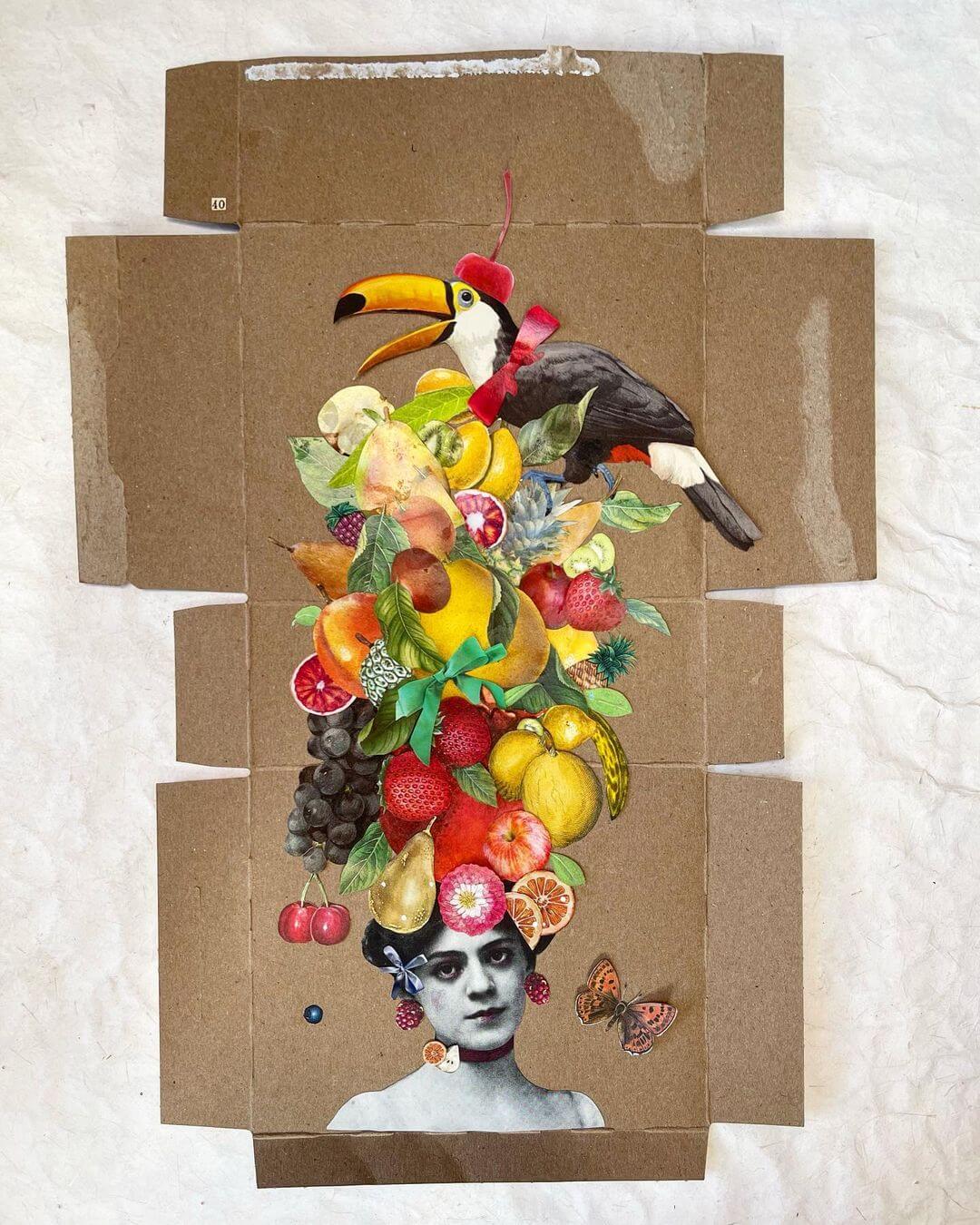 Flat cardboard box with colourful collage made from recycled magazines and newspapers of a woman with fruit and a toucan.