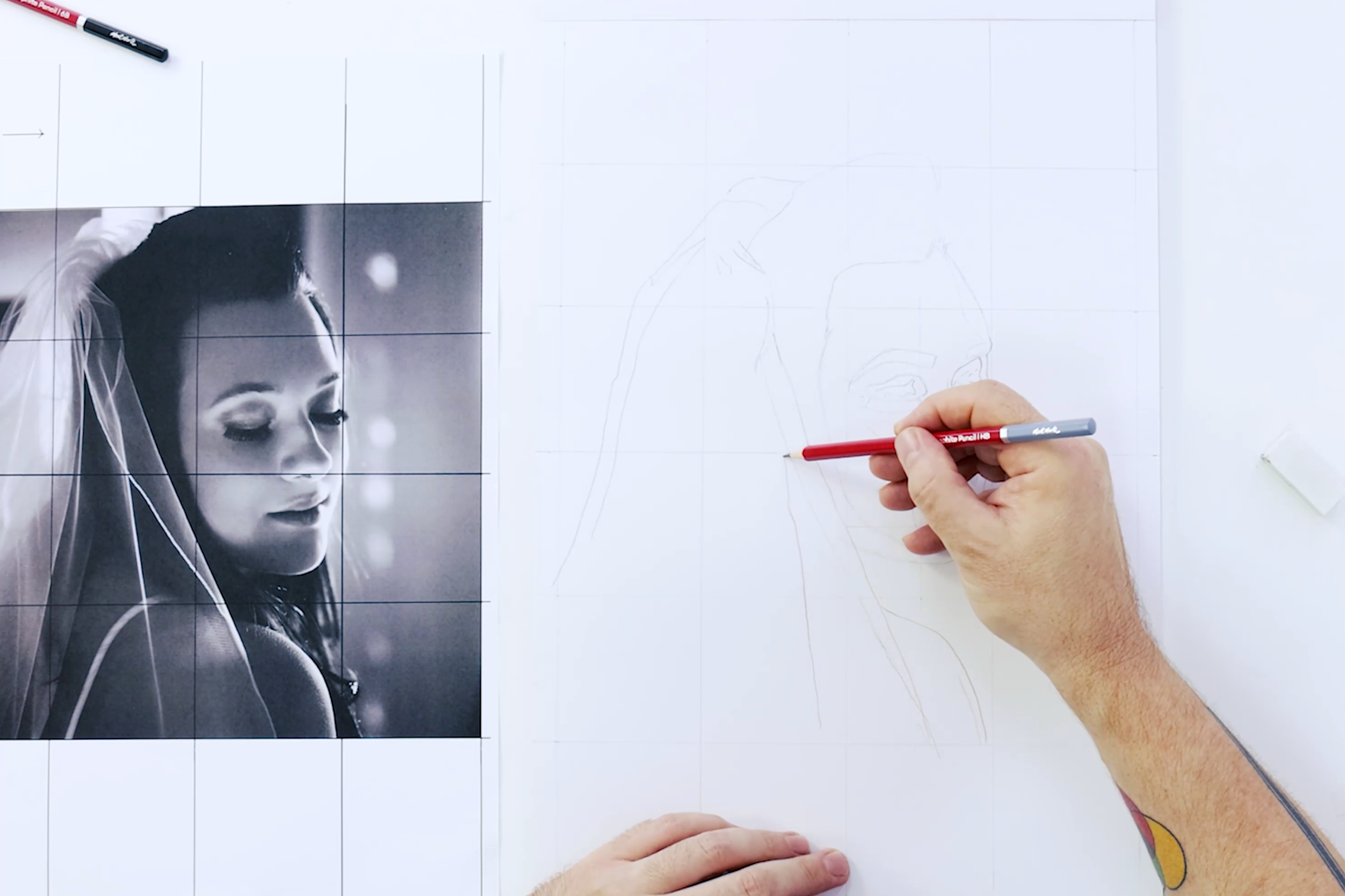 1. Gridded reference photo of a bride with a hand sketching next to it