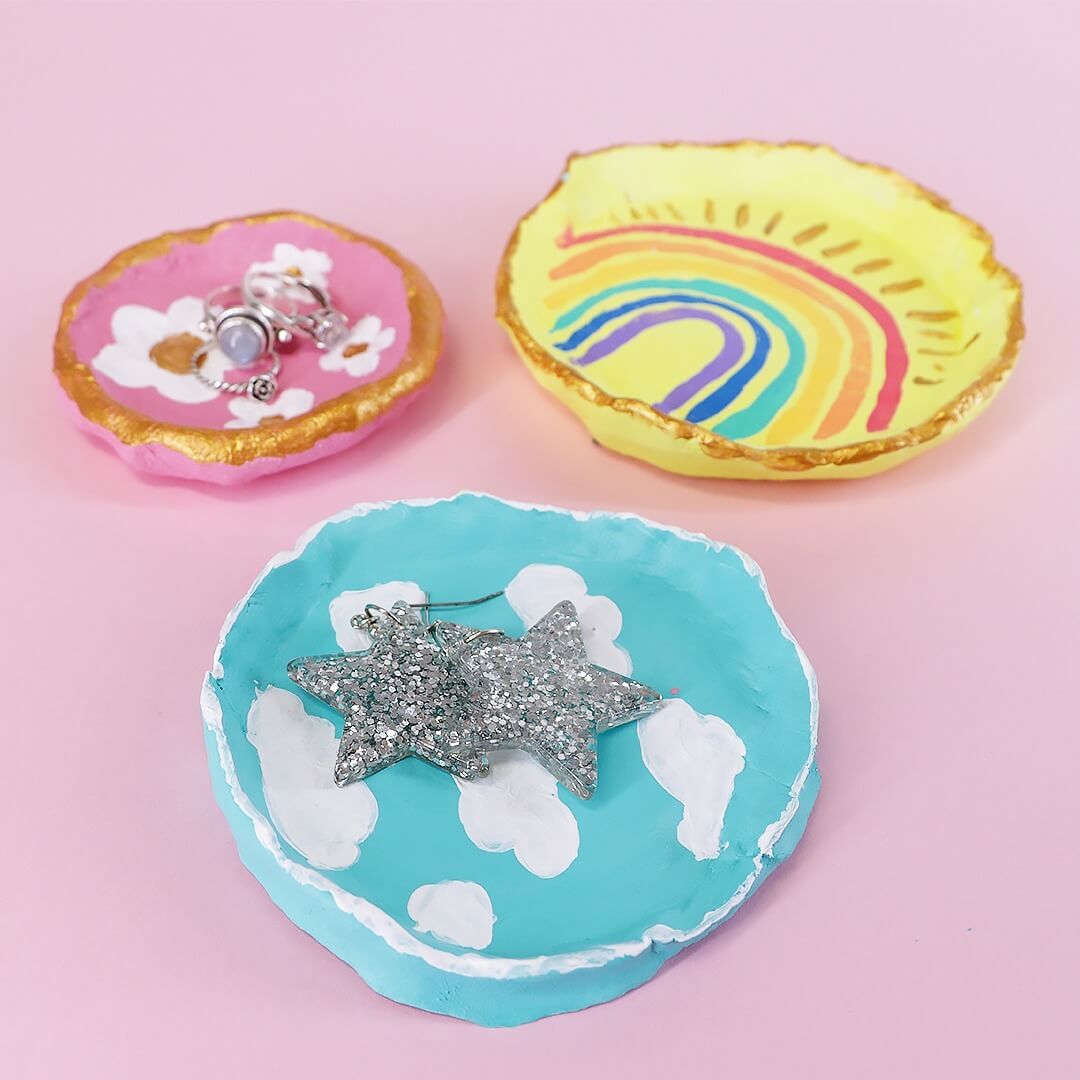 1. Three coloured air dry clay trinket dishes holding star earrings and rings