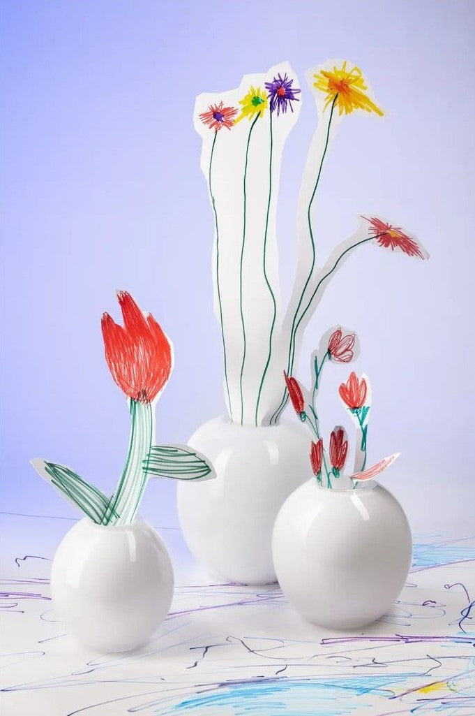 1. @frantisekjungvirt Flower drawings cut out and displayed in vases