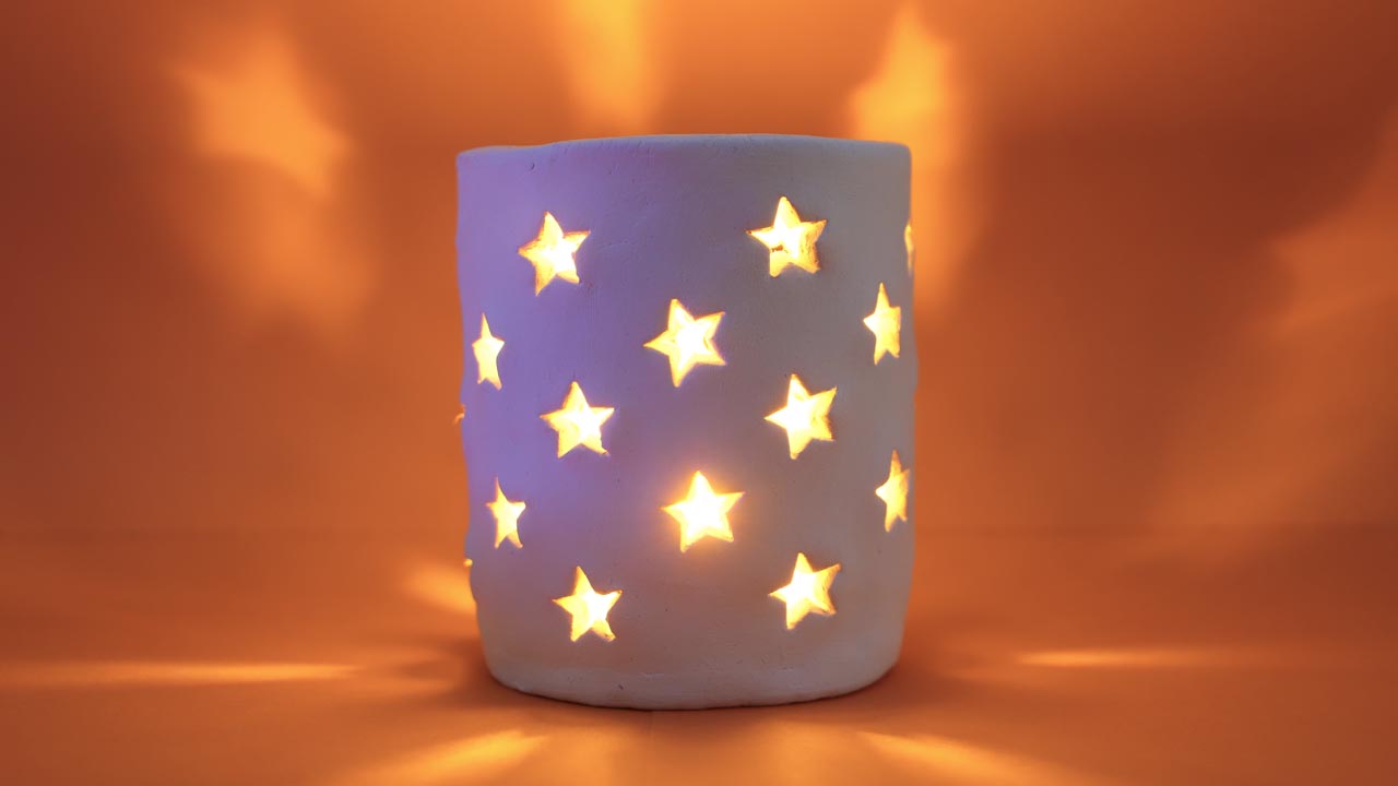 10. Lamp made from air hardening clay with star cut-outs