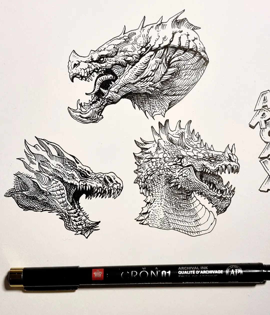 10. @alberto_sting 3 sketches of dragon heads smaller than the width of a pen