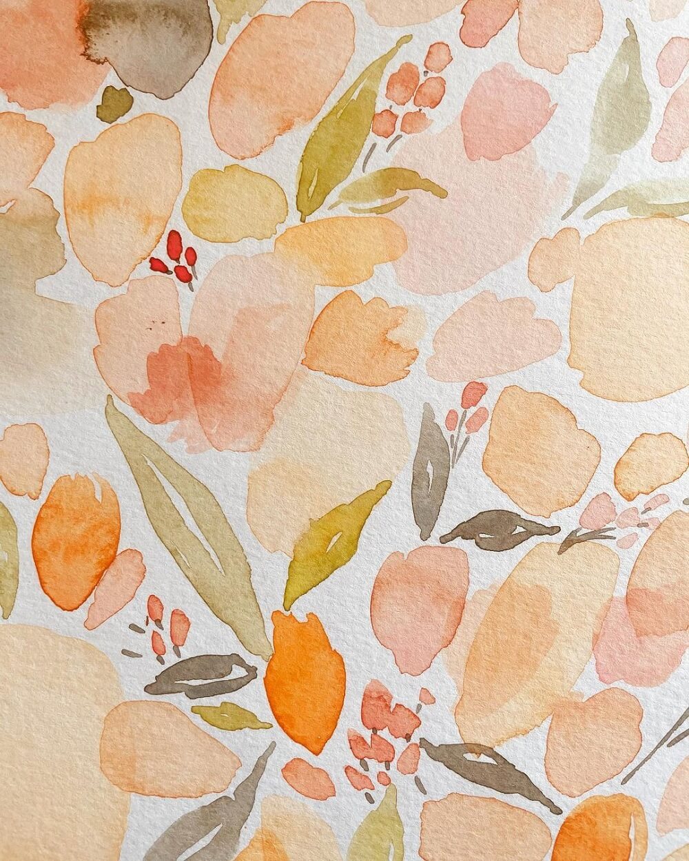 Watercolour artwork of different coloured circles with orange and peach flowers.