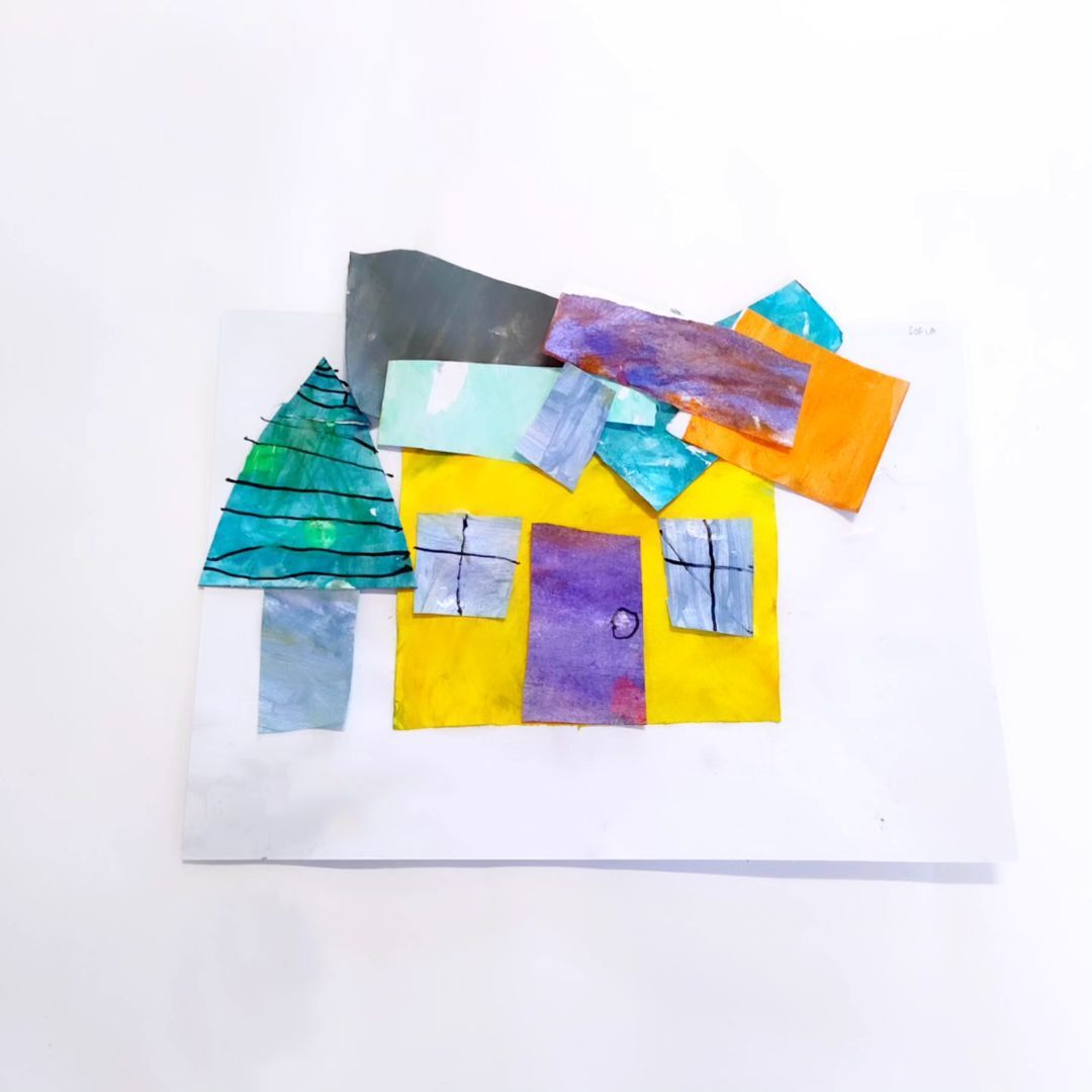 11. @wearethebusybees collage paper house craft with a pine tree next to it