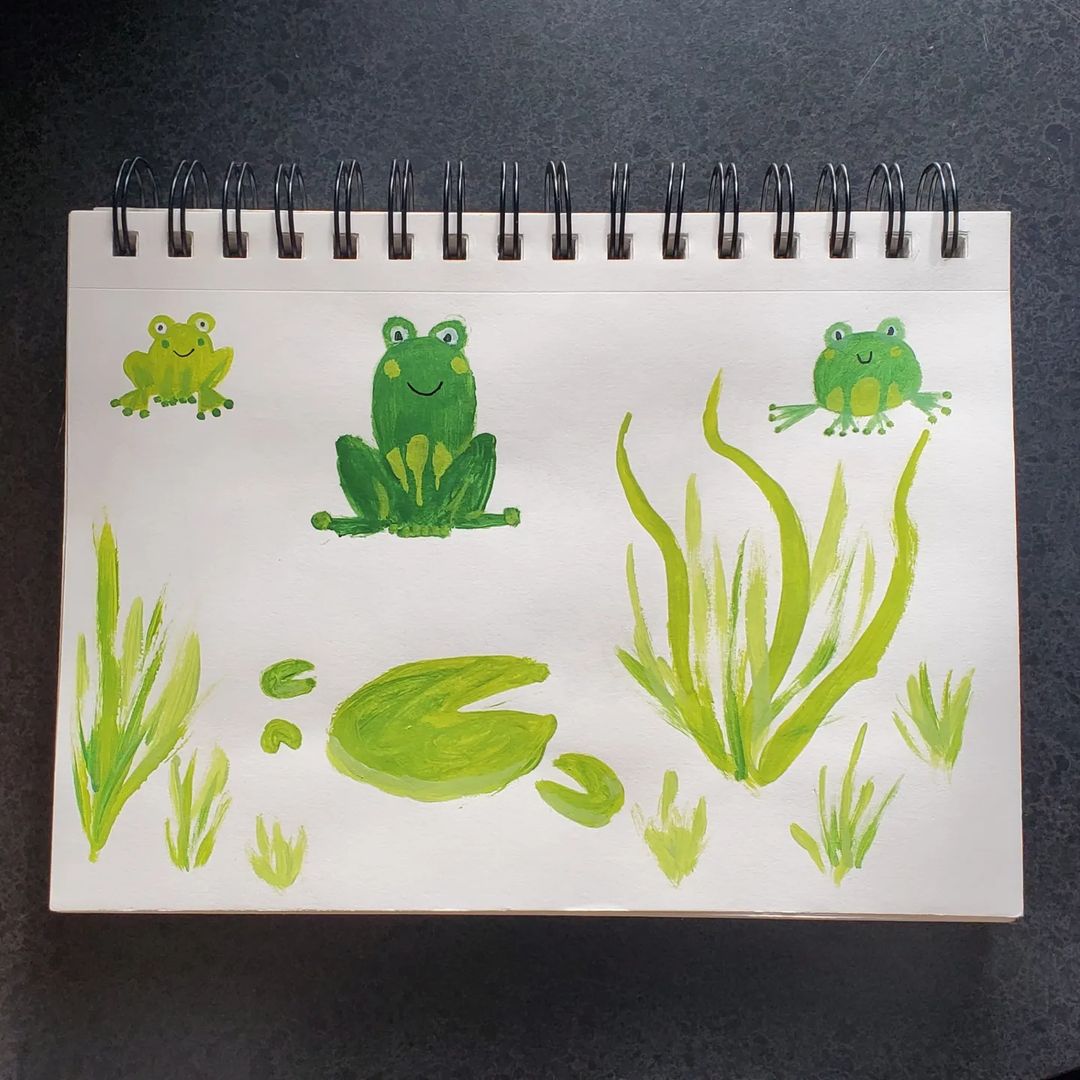 12. @lilnatureart painting of 3 green frogs amongst water reeds and lily pads