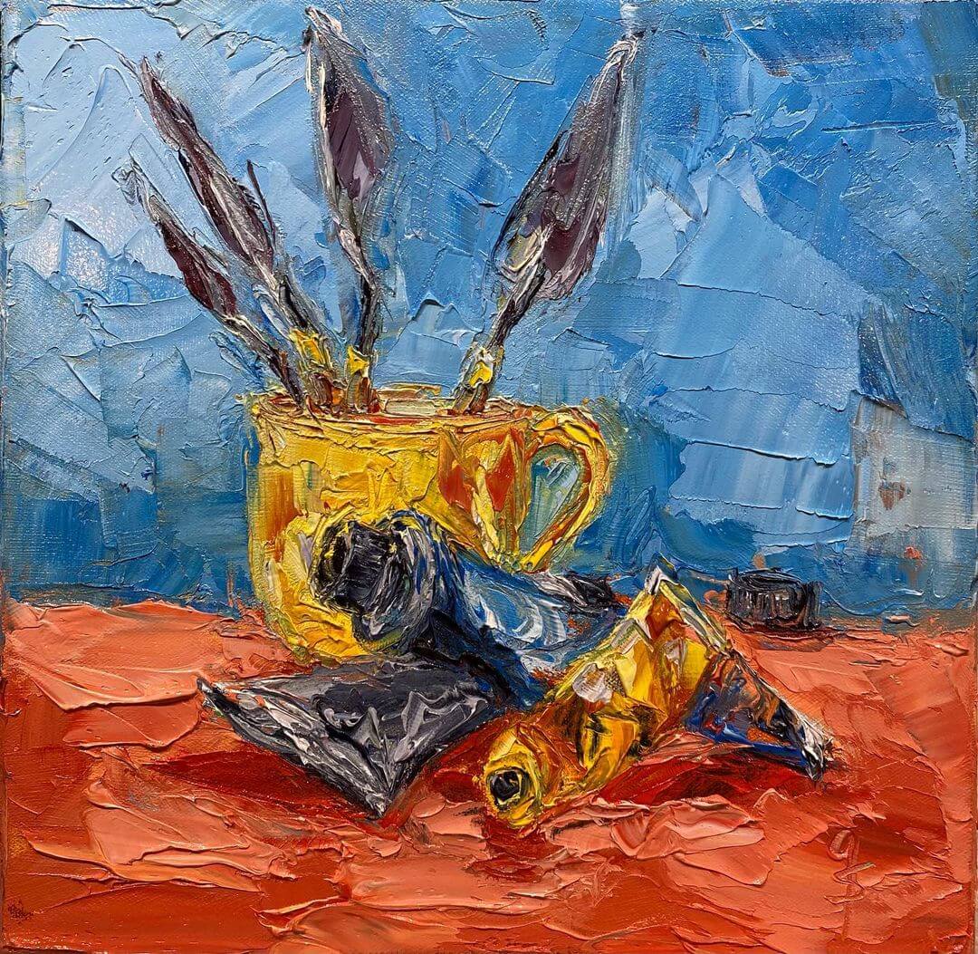 19. A palette knife painting with texture, of paint tubes and palette knives in a yellow mug.